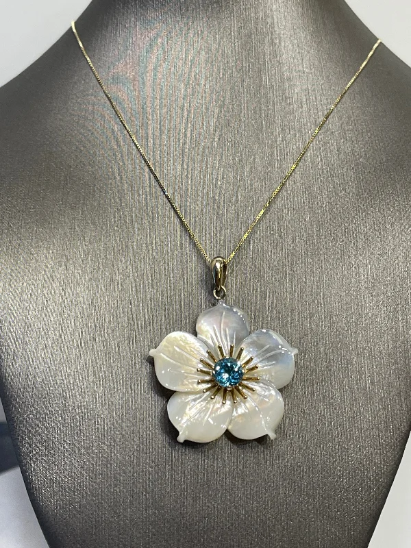 Custom Charm Necklaces For Personalized Designs-10 Karat Yellow Gold Blooming Mother of Pearl Flower With Blue Topaz Necklace