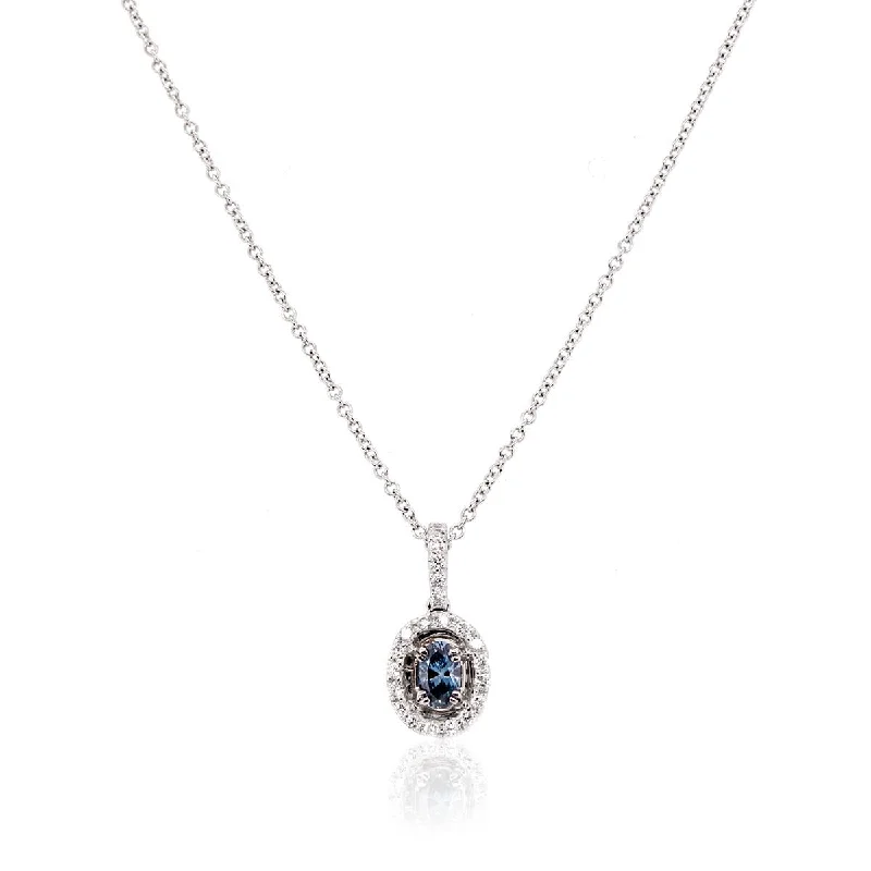 Simple Pendant Necklaces For Minimalist Look-WHITE GOLD PENDANT NECKLACE WITH BLUE ENHANCED OVAL DIAMOND